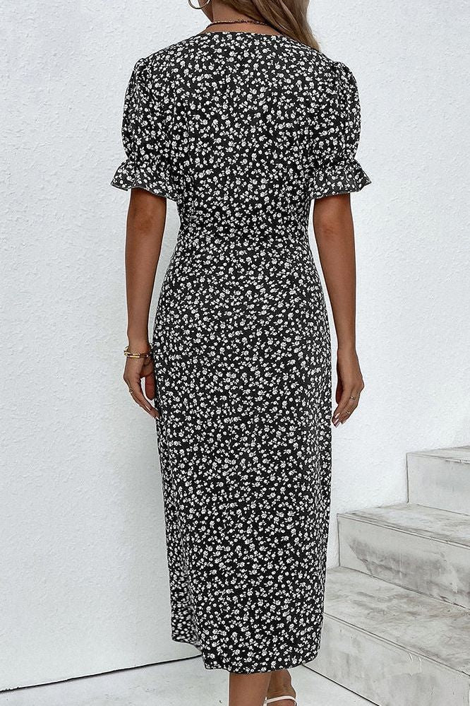 Close-up of elegant pleats on a women's midi dress, highlighting the comfortable, flowy fabric.