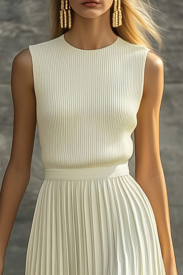 Stylish women's sleeveless pleated midi dress, an elegant flowing summer day dress for versatile fashion.