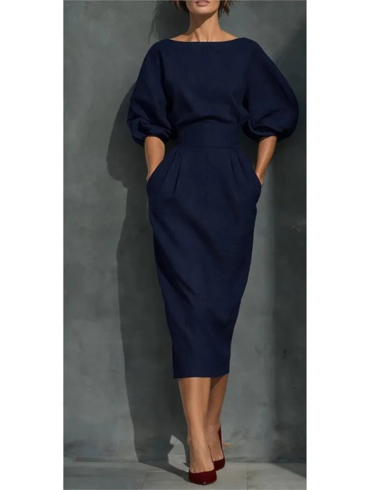 Versatile classic women's midi dress with elegant pleats & chic lantern sleeves for various occasions.