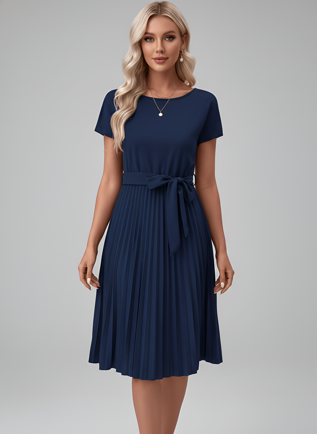 Modern women's belted pleated midi dress with short sleeves. Creates an elegant, flattering silhouette.