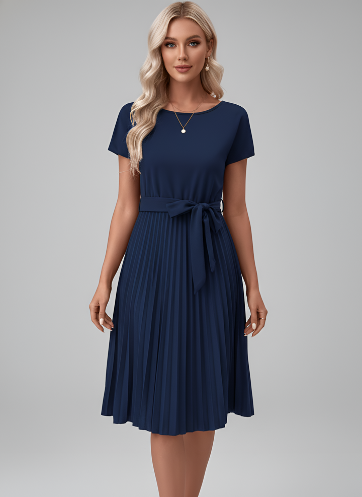 Modern women's belted pleated midi dress with short sleeves. Creates an elegant, flattering silhouette.