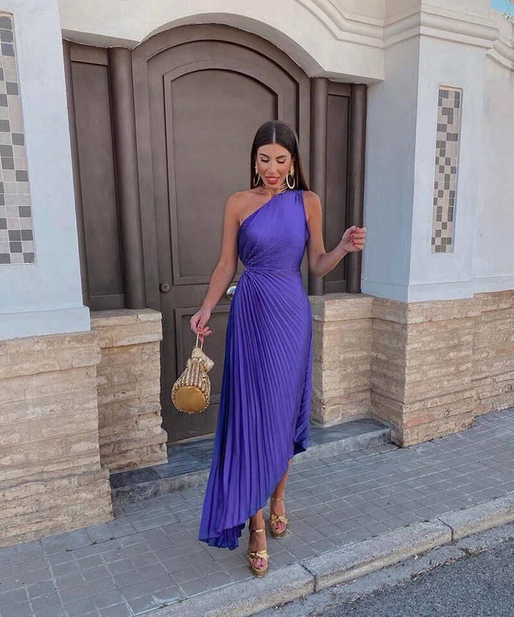 Elegant women's pleated one-shoulder maxi dress, perfect for wedding guests or formal evening events.