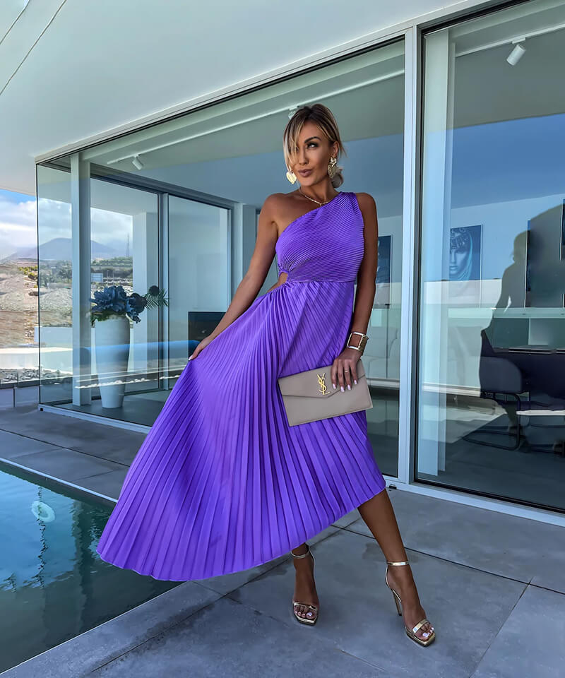 Stylish women's purple pleated one-shoulder maxi dress, ideal for wedding guest attire or special occasions.