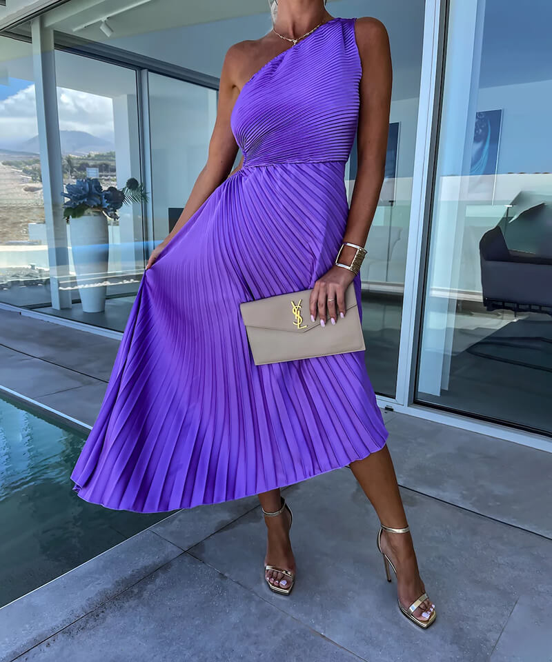 Stunning women's long pleated one-shoulder dress, an elegant choice for wedding guests, parties & cocktails.