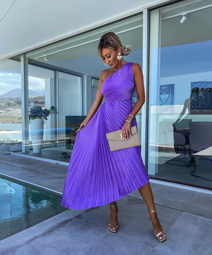 Formal women's maxi dress with pleats & one-shoulder design. A chic choice for wedding guest attire & galas.