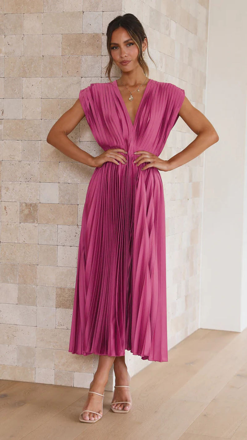 Comfortable women's flared midi dress with a V-neck and pleats. Versatile for daily wear or special occasions.