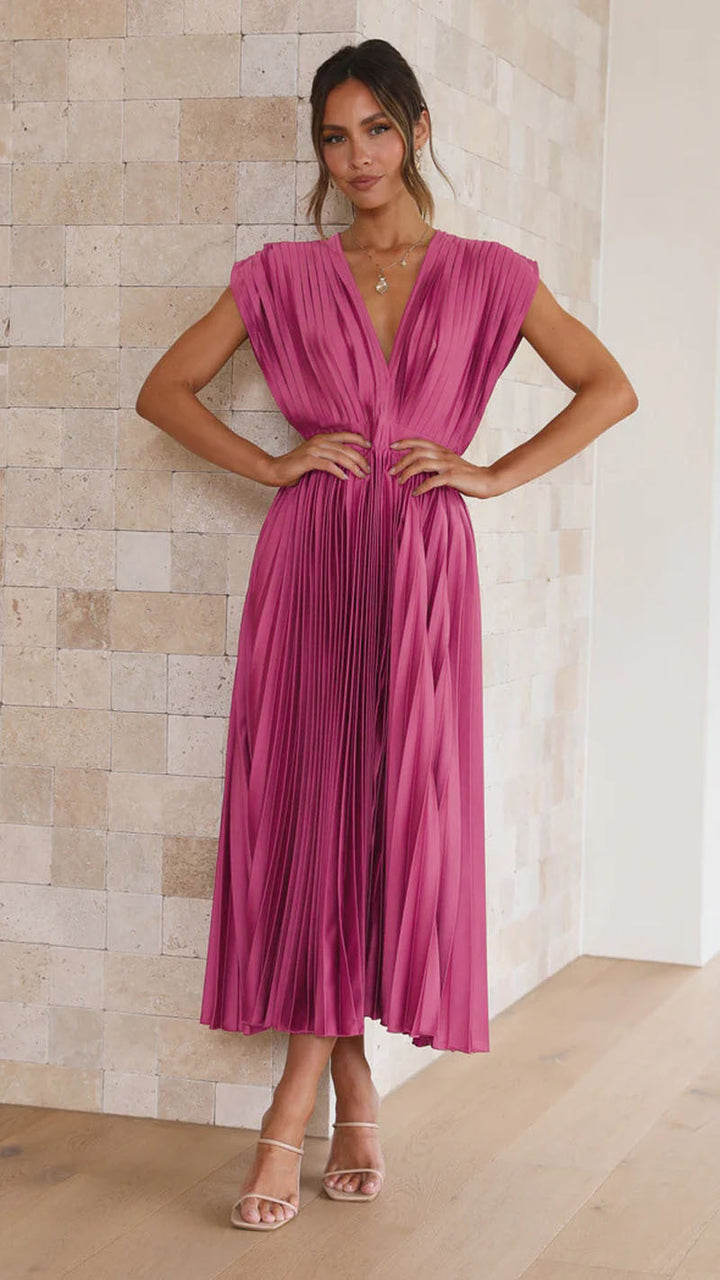 Comfortable women's flared midi dress with a V-neck and pleats. Versatile for daily wear or special occasions.