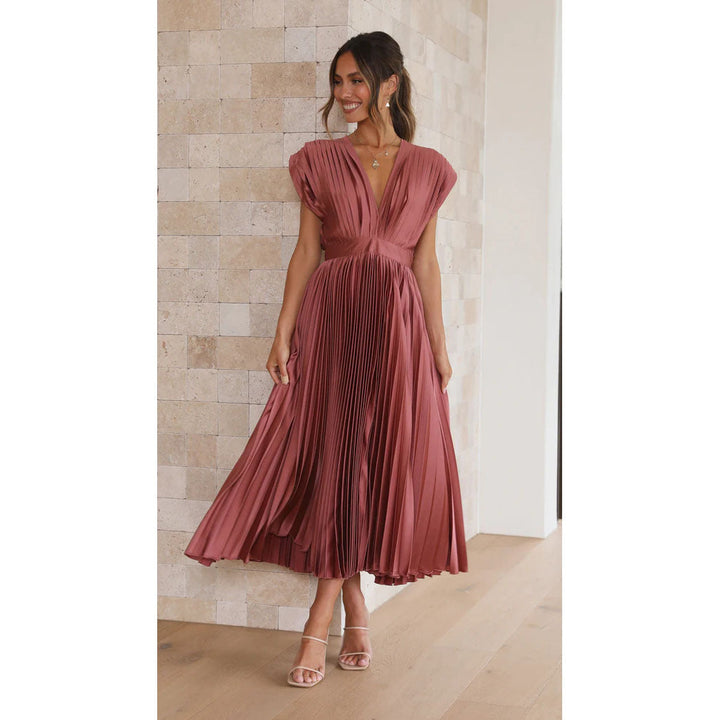 Women's V-neck midi dress featuring elegant pleats, a flared skirt, and comfortable, stylish design.