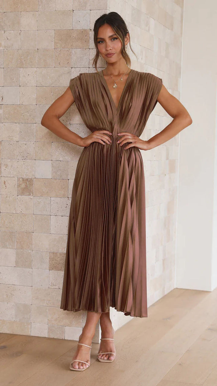 Versatile women's summer midi dress with a V-neck and beautiful pleats, suitable for various elegant occasions.