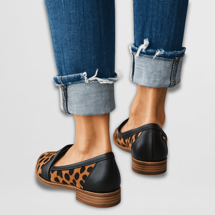 Comfortable camel pointed-toe flat loafers for women. Elegant slip-on shoes, versatile for office wear and casual chic.