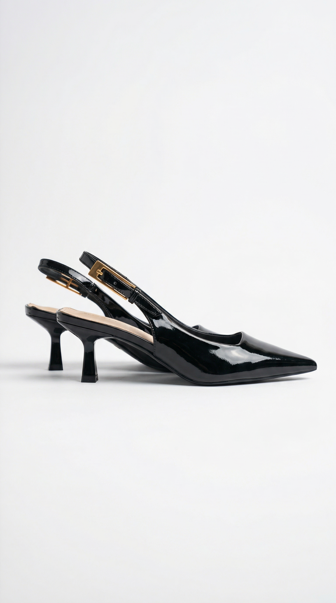 Chic ladies pointed toe slingback pumps with a comfortable kitten heel for fashion & parties.