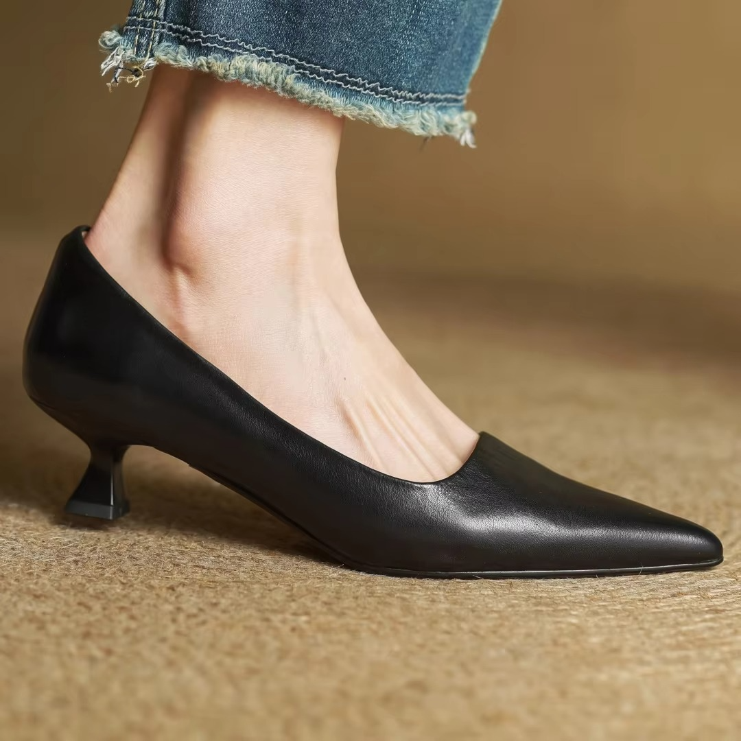 Sleek women's elegant pointed-toe pumps with a delicate thin heel for a sophisticated silhouette.
