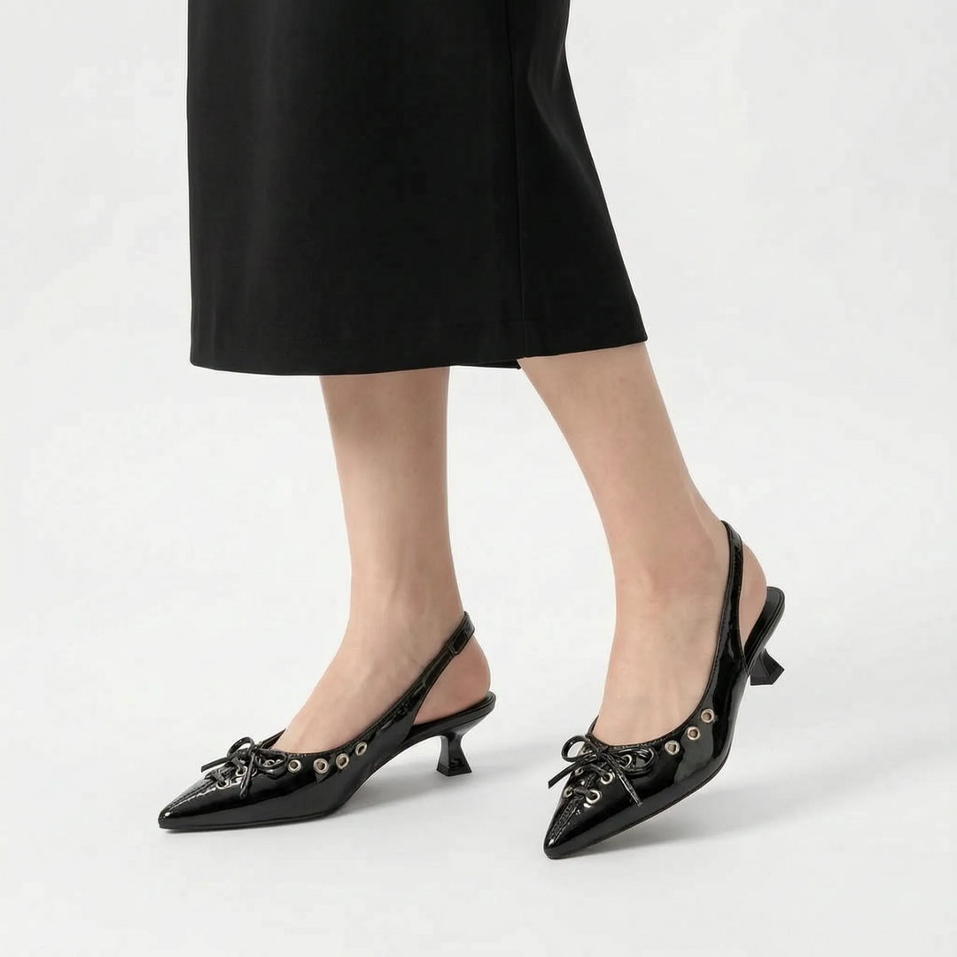 Stylish women's heels featuring a pointed toe and slingback design, offering elegant comfort for day or night.