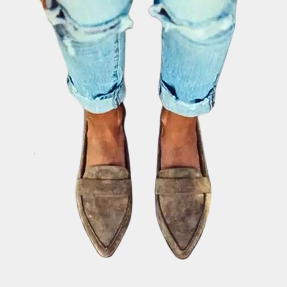 Stylish women's pointed-toe slip-on loafers, versatile for office, casual, & elegant outfits.