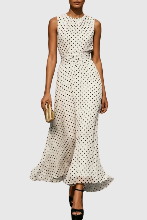 Elegant women's polka dot halter neck maxi dress with a stylish keyhole detail, perfect for summer parties.