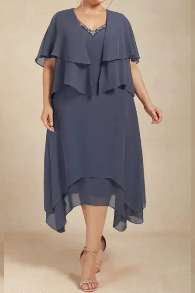 Elegant women's printed flowy midi dress for summer & spring. Comfortable relaxed fit, perfect for garden parties.