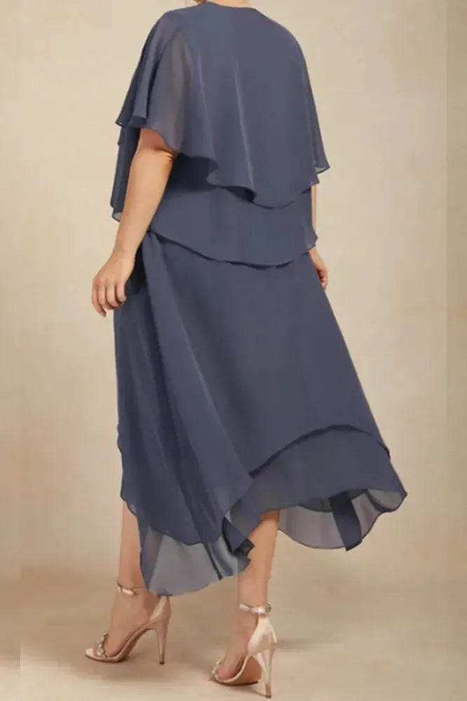 Stylish printed flowy midi dress for women, suitable for elegant special occasions or a chic garden party look.