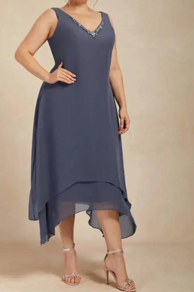 Beautiful printed flowy midi dress for women, featuring a relaxed fit. Elegant choice for summer, spring, or casual events.