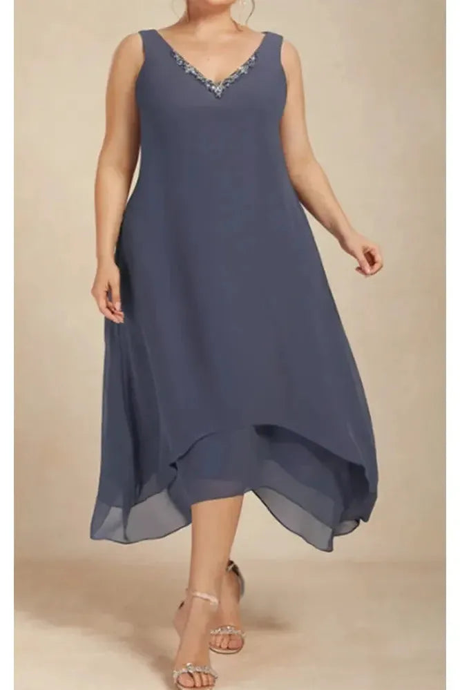 Women's elegant printed flowy midi dress. Relaxed, comfortable fit perfect for summer, spring casual, or garden parties.