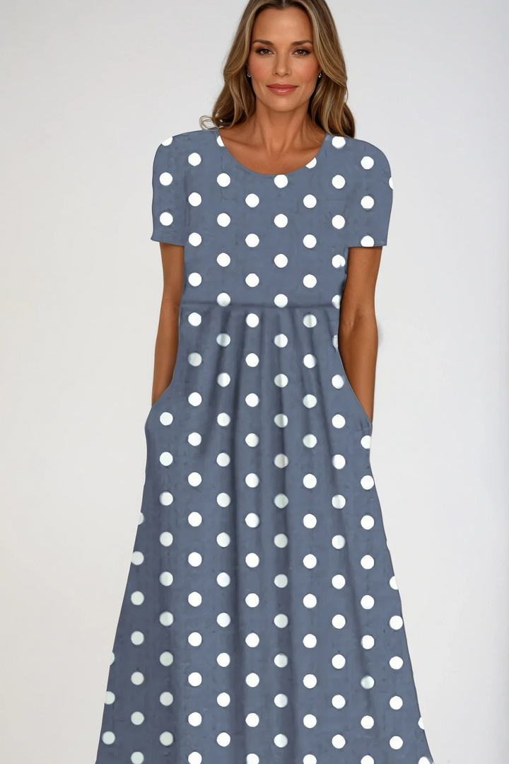 Women's elegant printed maxi dress, ideal for occasion wear. Comfortable long formal evening gown style.