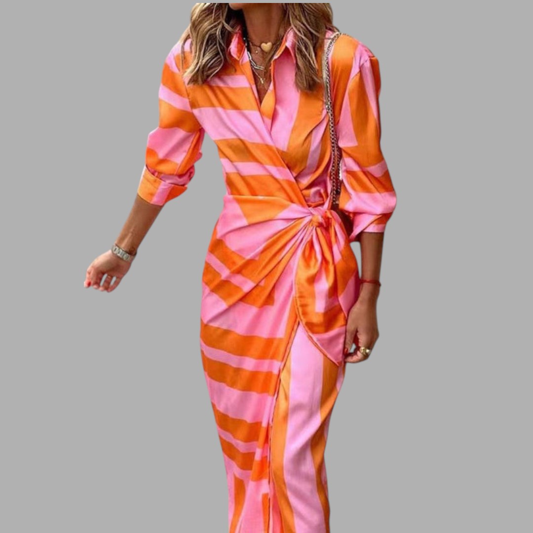 Elegant women's printed midi dress, featuring a sophisticated floral pattern. Ideal for semi-formal occasion wear.
