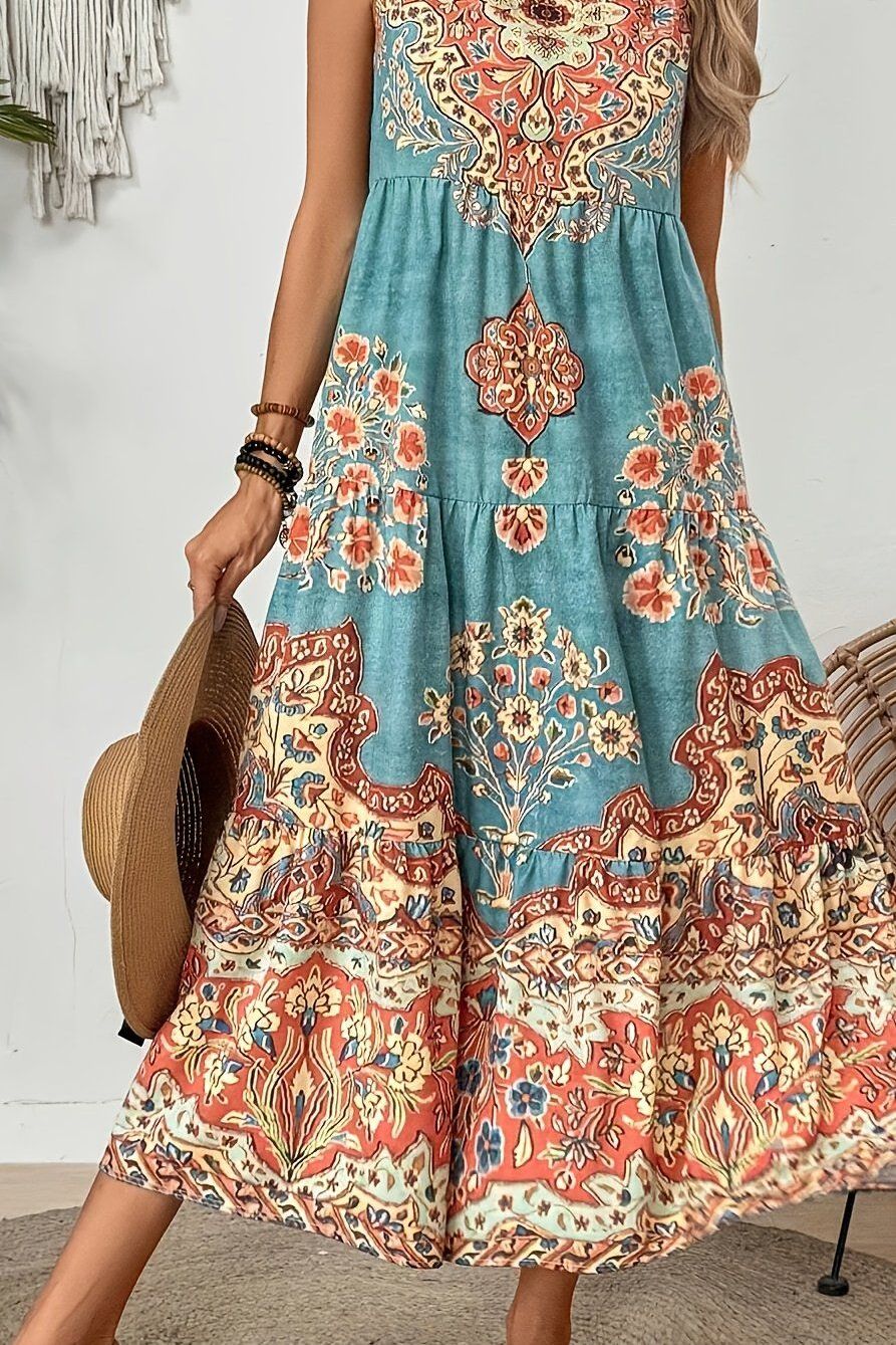 Comfortable women's waist-defined midi dress with an elegant print and flattering flowy silhouette.