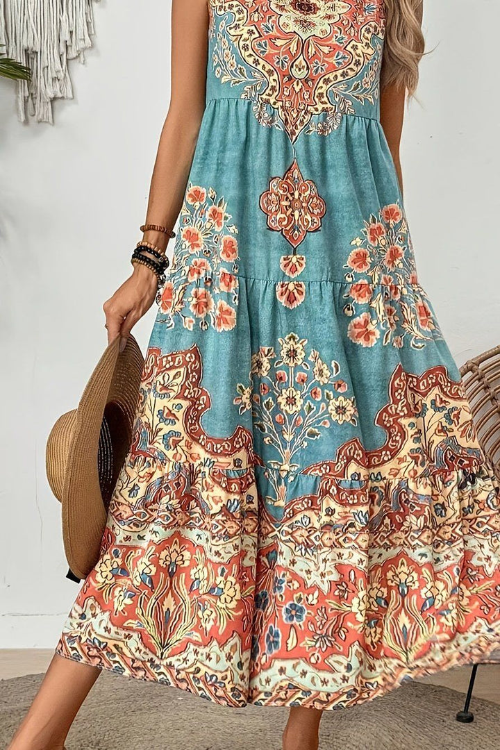 Comfortable women's waist-defined midi dress with an elegant print and flattering flowy silhouette.