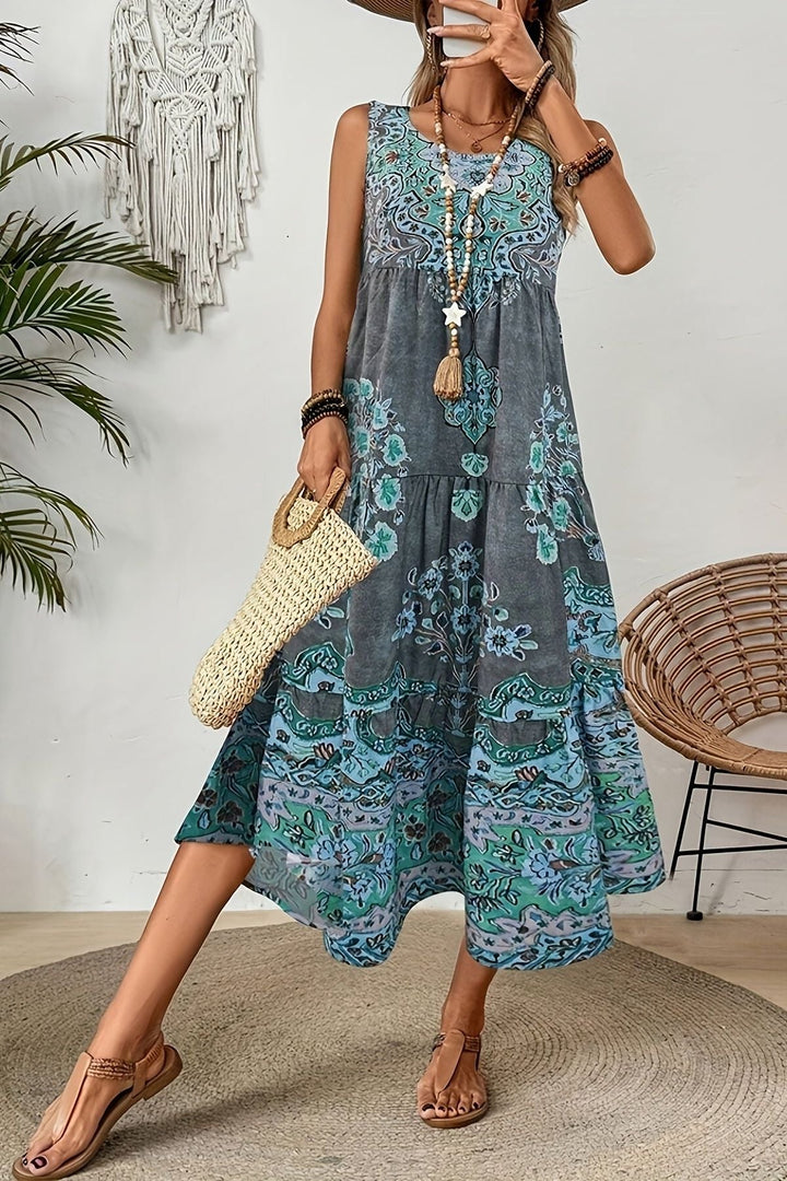 Comfortable women's flowy midi dress in a vibrant print, ideal for summer style & casual daytime wear.