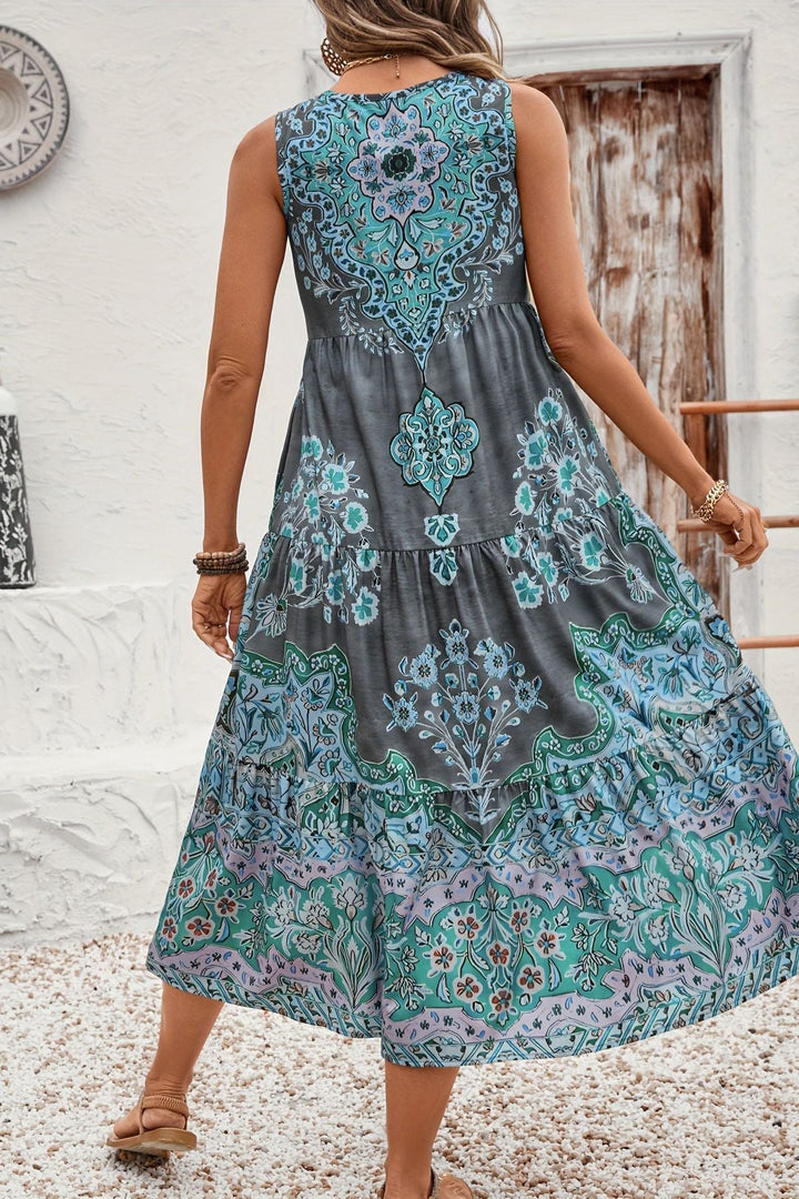 Flattering women's printed midi dress with a waist-defined design and elegant flowy A-line silhouette.