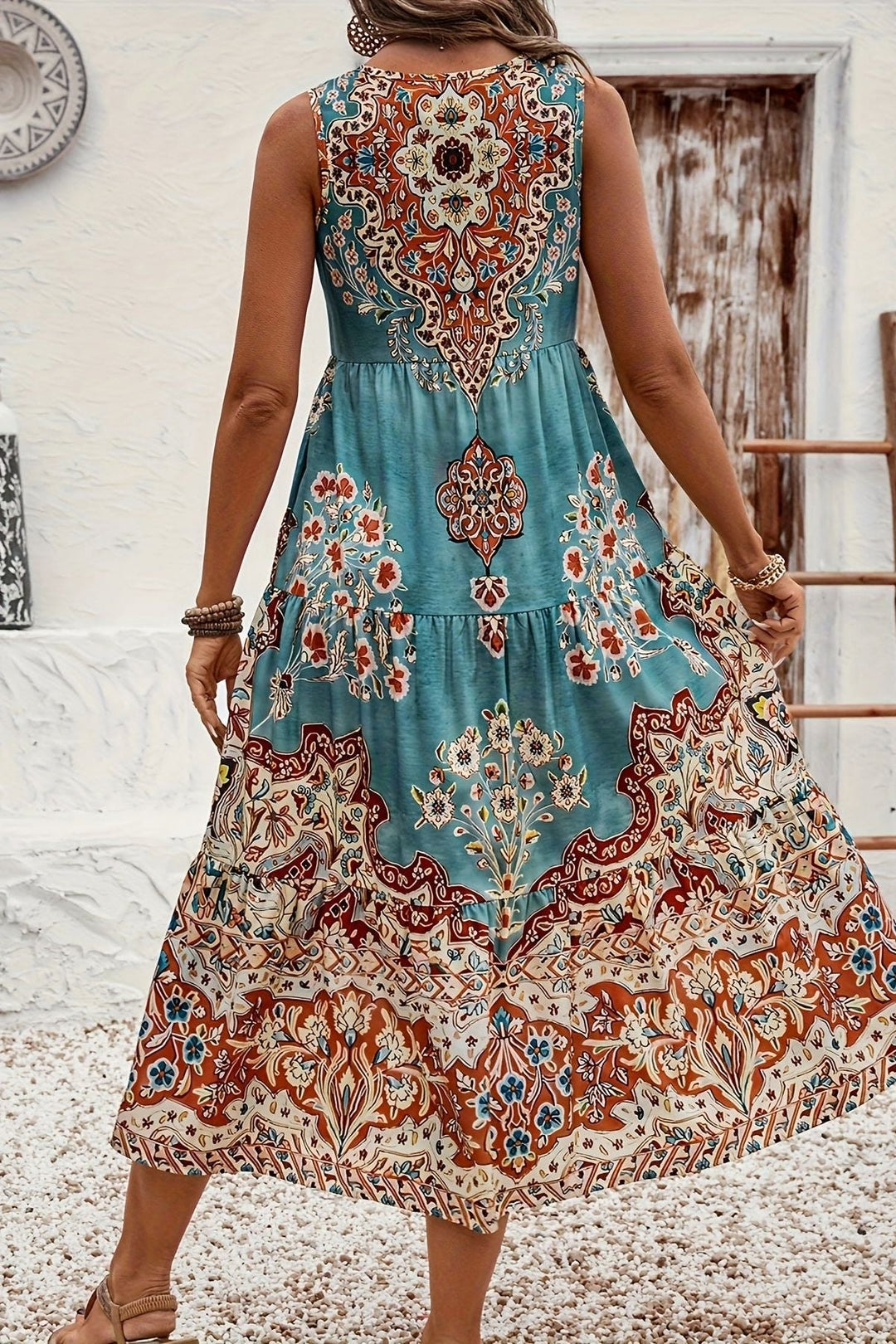 Versatile women's printed midi dress, an elegant and flowy option for both casual and occasion wear.