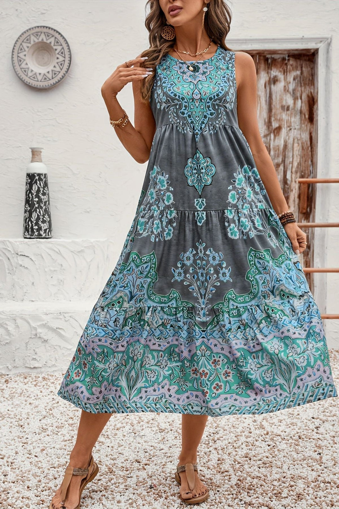 Flattering women's flowy midi dress in a stylish print, perfect for elegant summer and daytime wear.
