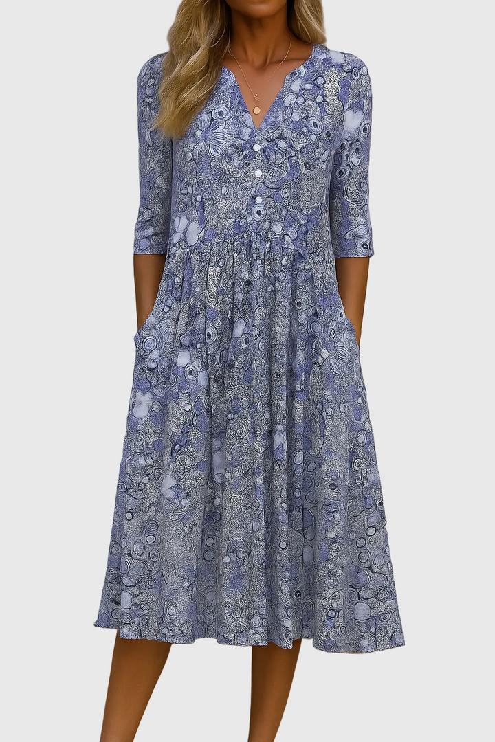 Comfortable women's elegant V-neck midi dress with stylish print & flowy fit, ideal for casual or dressy spring/summer wear.