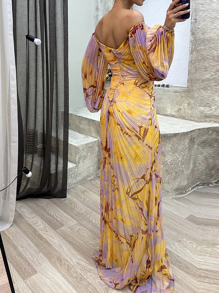 Stylish printed off-shoulder maxi dress, a stunning statement piece for wedding guests or evening wear.