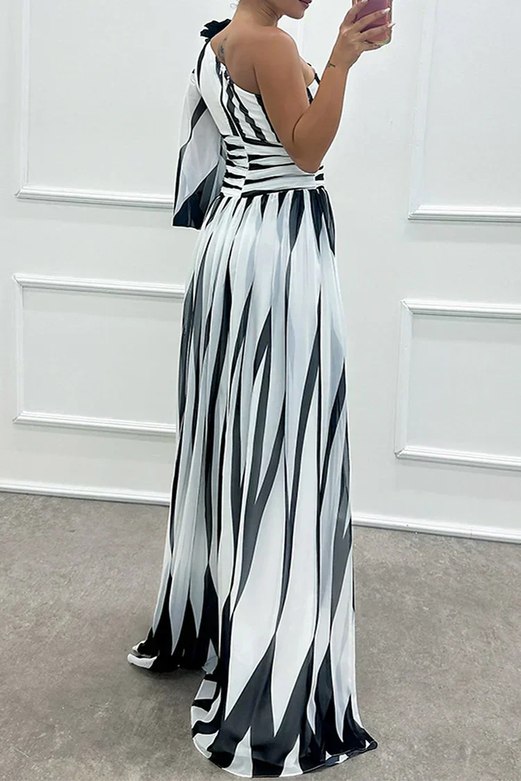 Fashionable wedding guest maxi dress; printed, one-shoulder design. Perfect formal wear for special events.