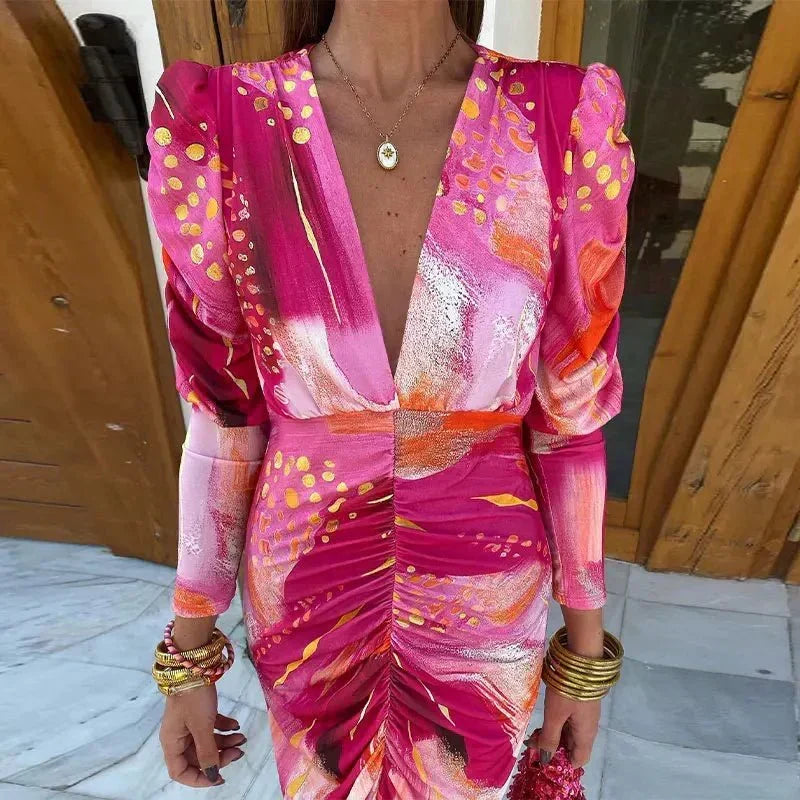 Chic women's printed ruched midi dress, ideal as an elegant wedding guest, cocktail, or evening party outfit.
