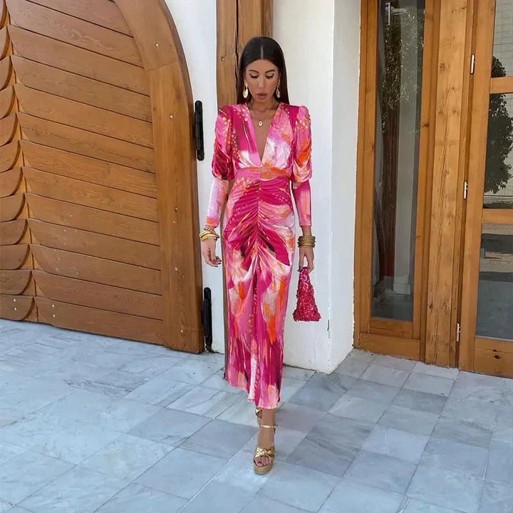Beautiful printed ruched midi dress for women, an elegant wedding guest & cocktail party choice.