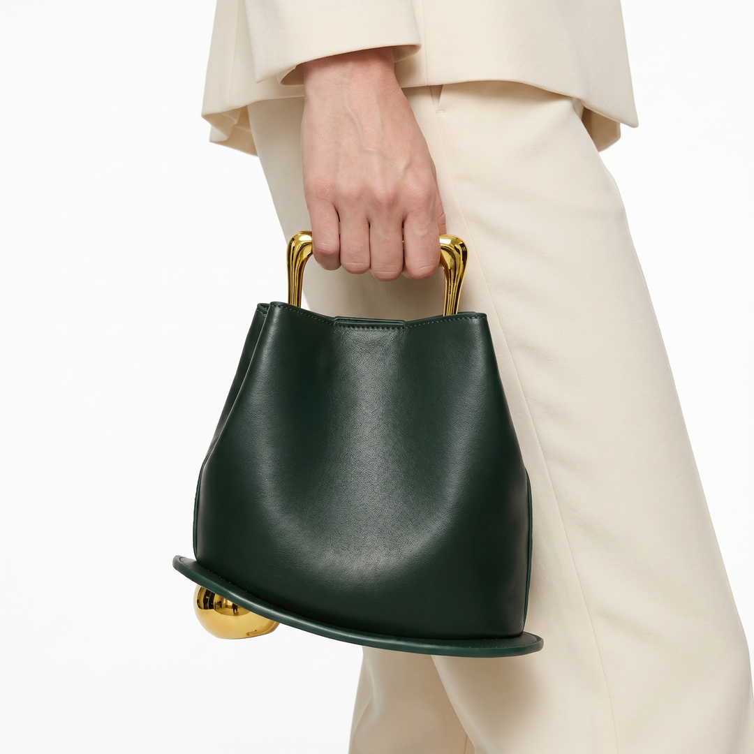 Elegant women's PU leather bucket shoulder bag with hasp closure. Perfect for everyday luxury and modern style.