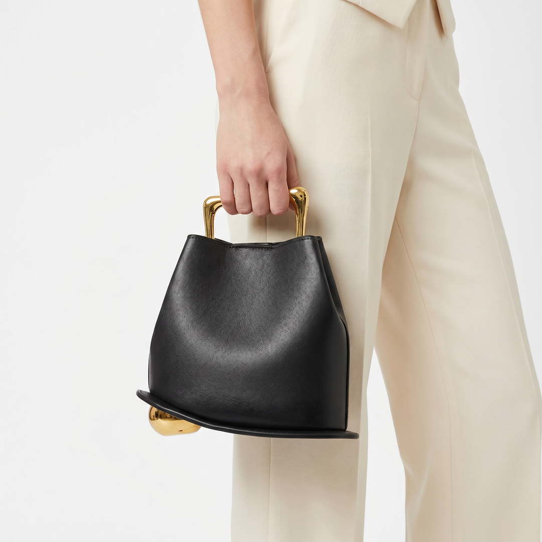 Structured PU leather bucket bag for women, an elegant shoulder carry with a luxury feel. Ideal everyday accessory.