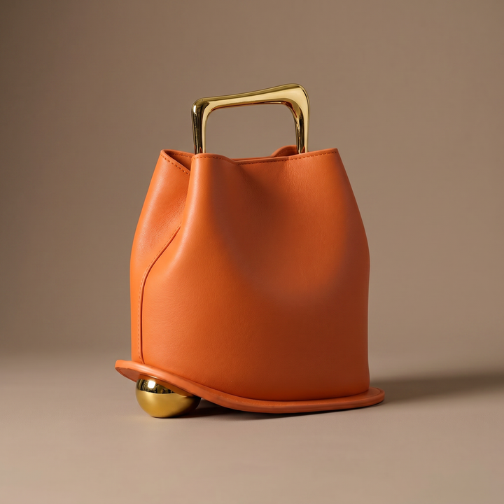 Luxury style women's bucket shoulder bag. Elegant PU leather, modern accessory for versatile everyday fashion carry.