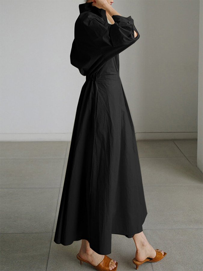 Beautiful women's maxi dress featuring elegant puff sleeves, a flattering twist waist, and V-neck.