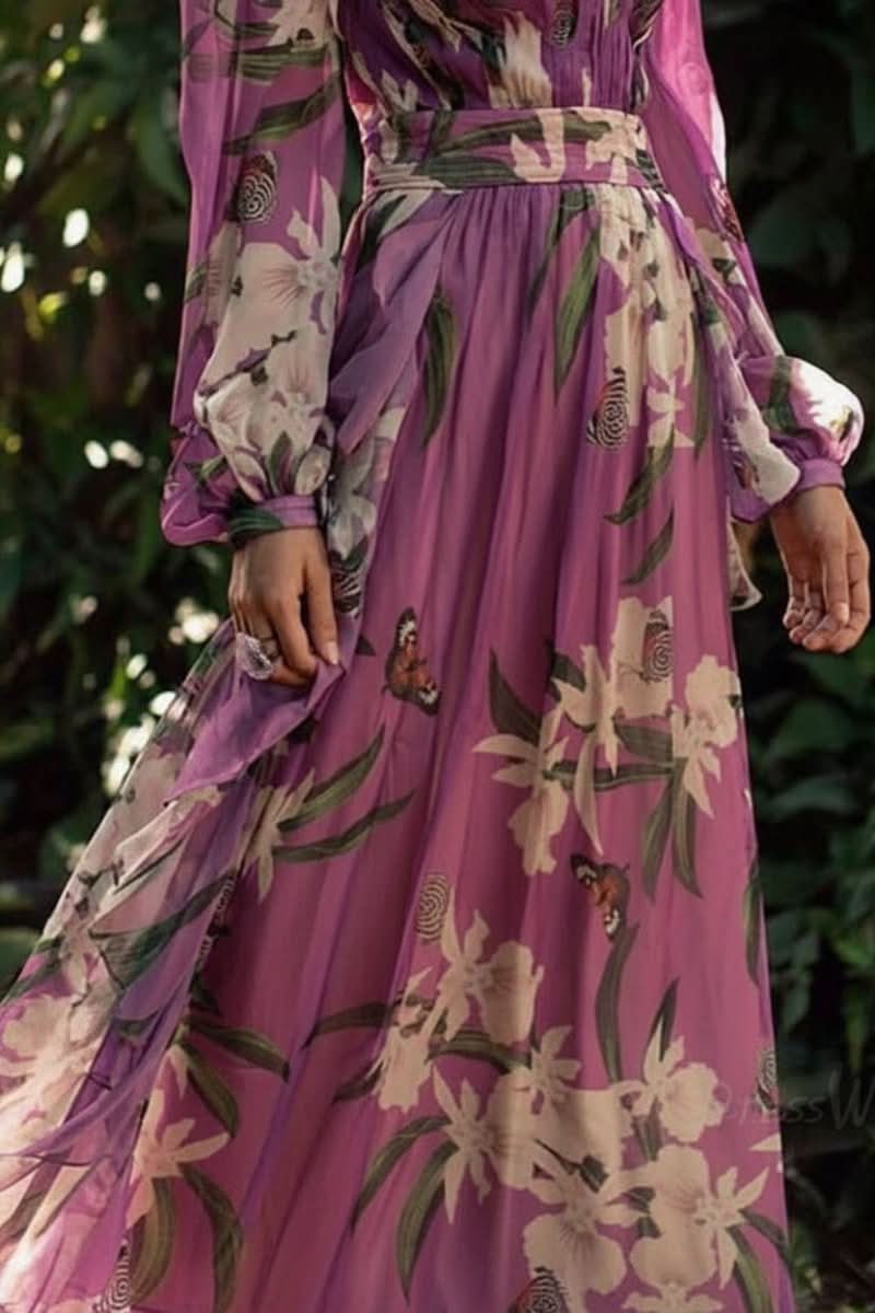 Stunning women's radiant purple V-neck maxi dress, showcasing its elegant silhouette and long flowing design.