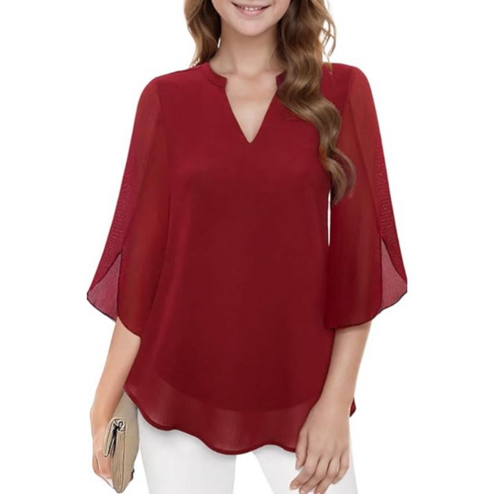 Relaxed fit women's long sleeve blouse. Stylish and comfortable top, perfect for versatile casual & office looks.