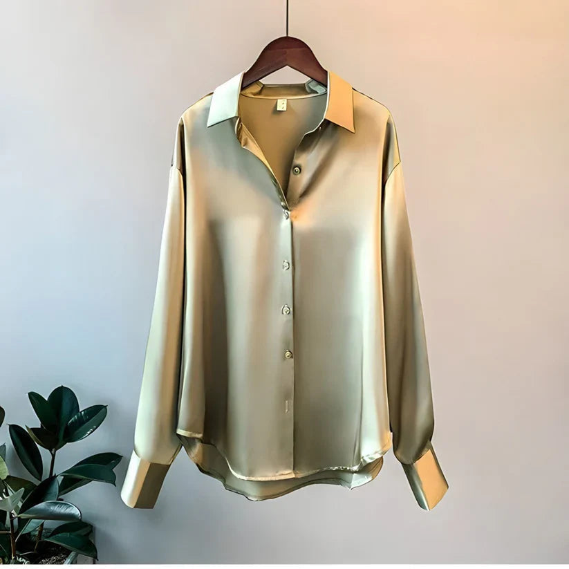 Stylish women's long sleeve button down top. Versatile elegant blouse for office wear or evening events.