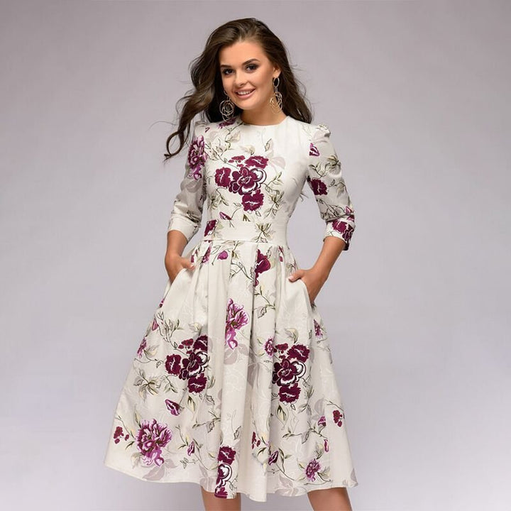 Elegant women's retro A-line midi dress with 3/4 sleeves. Perfect for parties & classic fashion.