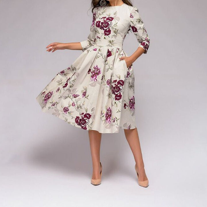 Flattering women's A-line midi dress, 3/4 sleeves, for an elegant retro style or office wear.