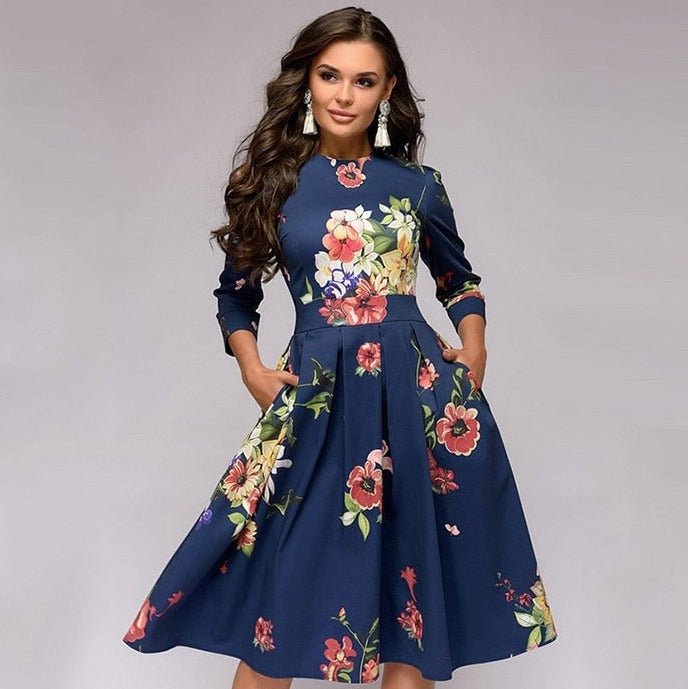 Back view of an elegant women's retro A-line midi dress with 3/4 sleeves, showcasing the flattering fit.