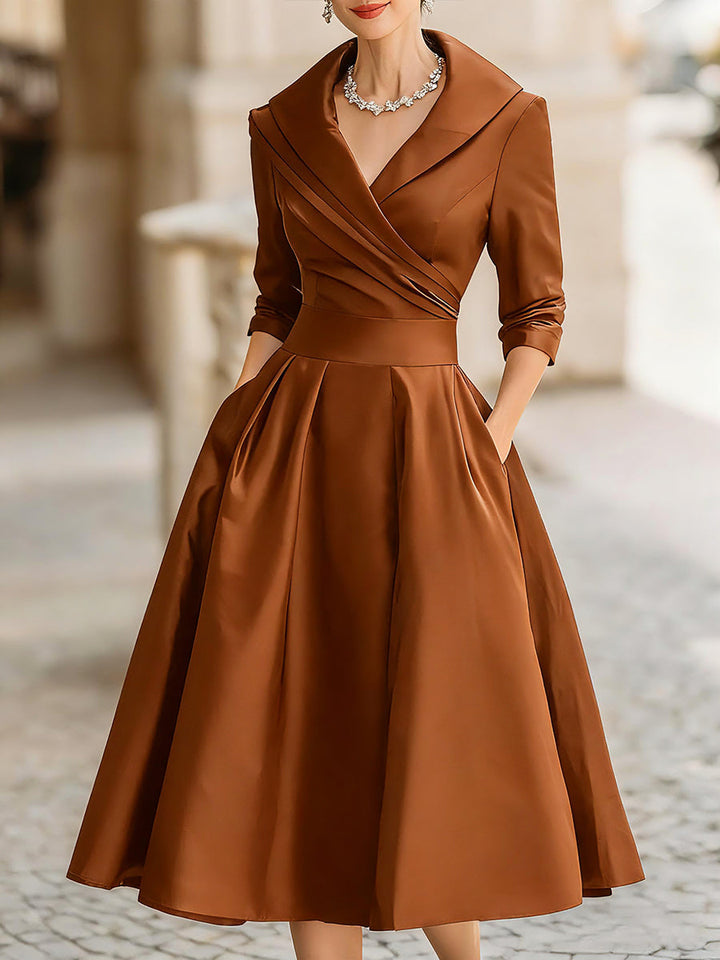 Women's elegant evening midi dress featuring a unique draped collar and A-line silhouette.