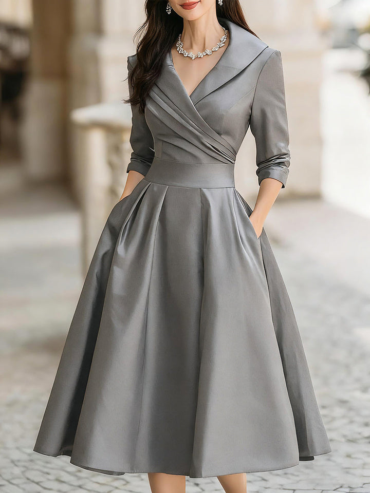 Special occasion midi dress for women, with a sophisticated draped collar and long sleeves.
