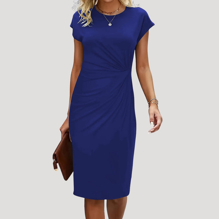 Modern professional women's midi dress. Elegant ruched cap sleeve style for work, smart casual, and a fitted silhouette.