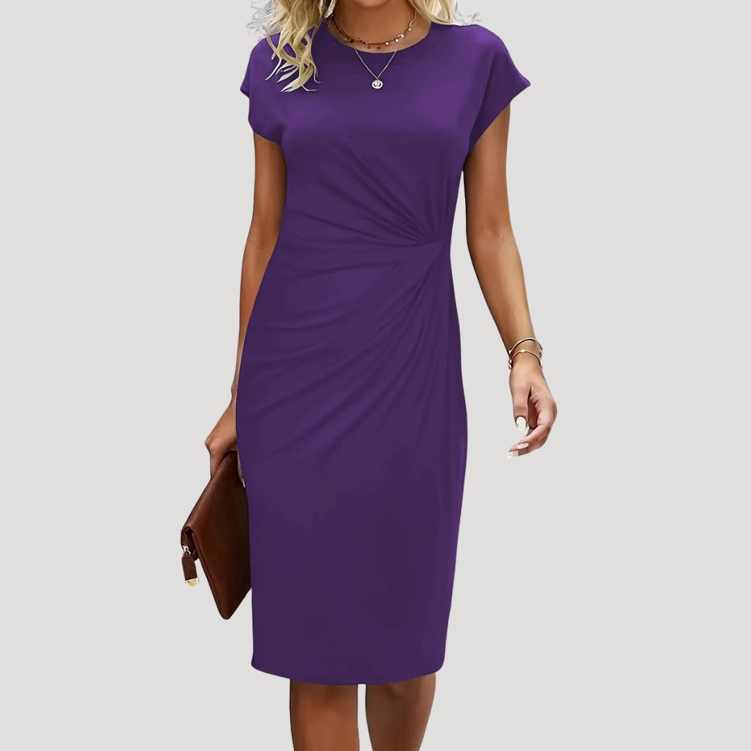 Beautiful women's midi dress featuring ruched details, cap sleeves, & a flattering silhouette for elegant style.